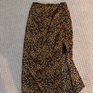 Silk, slit skirt with fun spotted pattern